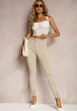 Jasnobeżowe Dopasowane Jeansy z Postrzępioną Nogawką Harthi