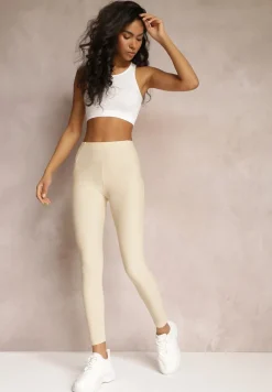 Jasnobeżowe Legginsy Hyraste