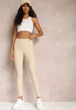 Jasnobeżowe Legginsy Hyraste