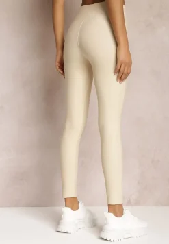 Jasnobeżowe Legginsy Hyraste