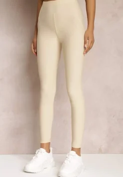 Jasnobeżowe Legginsy Hyraste