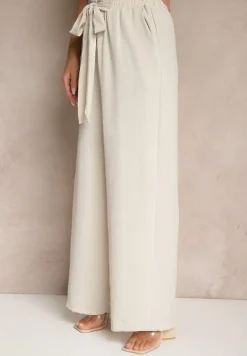 Jasnobeżowe Spodnie z Wiskozą o Szerokim Kroju z Wiązanym Paskiem Zileindra