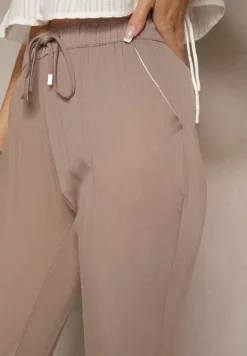 Jasnobrązowe Spodnie Dresowe High Waist z Ozdobnym Wiązaniem Ellivaria