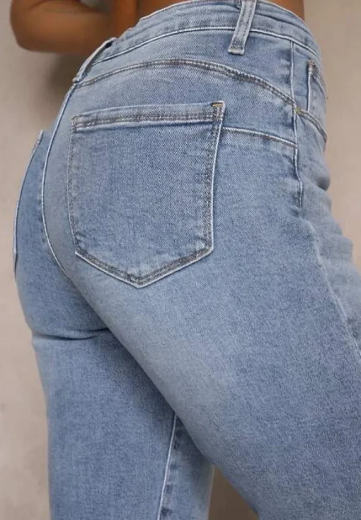 Jasnoniebieskie Jeansy High Waist o Kroju Mom Fit Delarinor