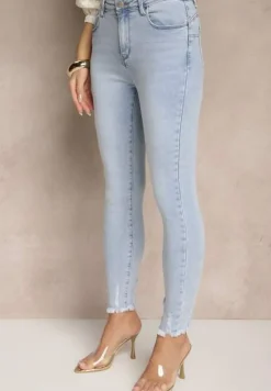 Jasnoniebieskie Jeansy o Fasonie Skinny Push Up Zdobione Przetarciami Salzeri
