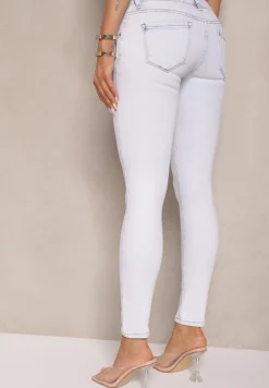 Jasnoniebieskie Jeansy Z Bawełny Typu Skinny Ozdobione Przetarciami Salliwen