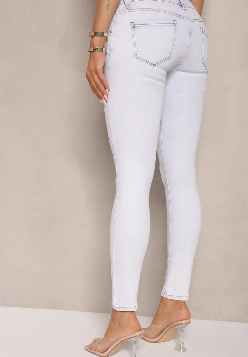 Jasnoniebieskie Jeansy Z Bawełny Typu Skinny Ozdobione Przetarciami Salliwen