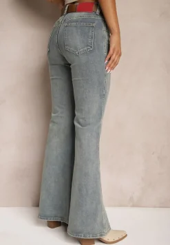 Jasnoniebieskie Jeansy z Bawełny Dzwony High Waist z Paskiem i Ozdobnymi Kieszeniami Mevalia