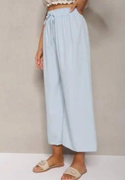 Jasnoniebieskie Spodnie High Waist z Szerokimi Nogawkami z Wiskozą Wykończone Gumką w Talii Crisantas