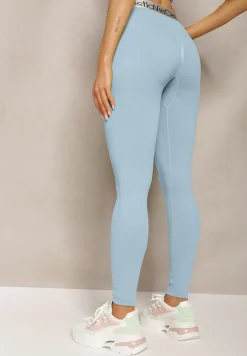 Jasnoniebieskie Sportowe Legginsy Elastyczne z Ozdobną Szeroką Gumą w Pasie Larnode