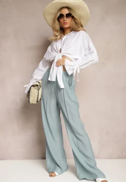 Jasnoniebieskie Szerokie Spodnie z Wiskozy i Gumką w Pasie Abyga