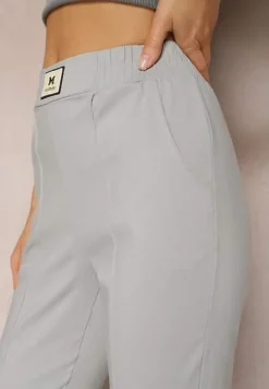 Jasnoszare Spodnie High Waist z Elastycznego Materiału Wykończone Gumką Rigadona
