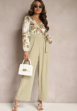 Jasnozielony Kwiatowy Kombinezon z Kopertowym Dekoltem z Paskiem i Szerokimi Nogawkami Vinia