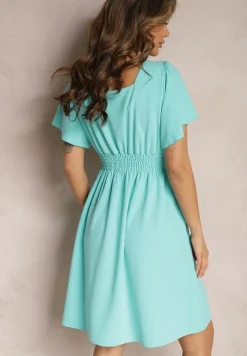 Niebieska Sukienka z Rozkloszowanym Dołem i Ozdobnymi Przeszyciami Celarsa