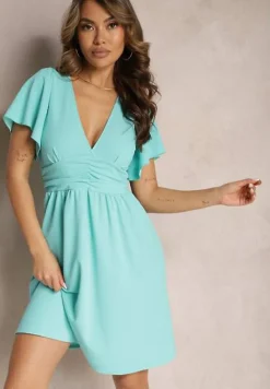 Niebieska Sukienka z Rozkloszowanym Dołem i Ozdobnymi Przeszyciami Celarsa