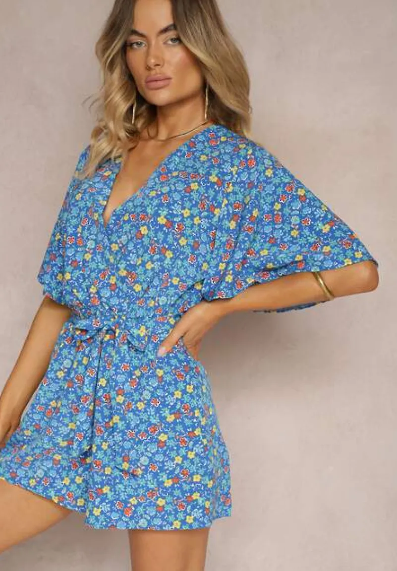 Niebieski Kombinezon z Kopertowym Dekoltem o Taliowanym Kroju Kimelba