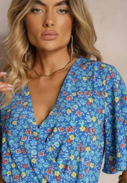 Niebieski Kombinezon z Kopertowym Dekoltem o Taliowanym Kroju Kimelba