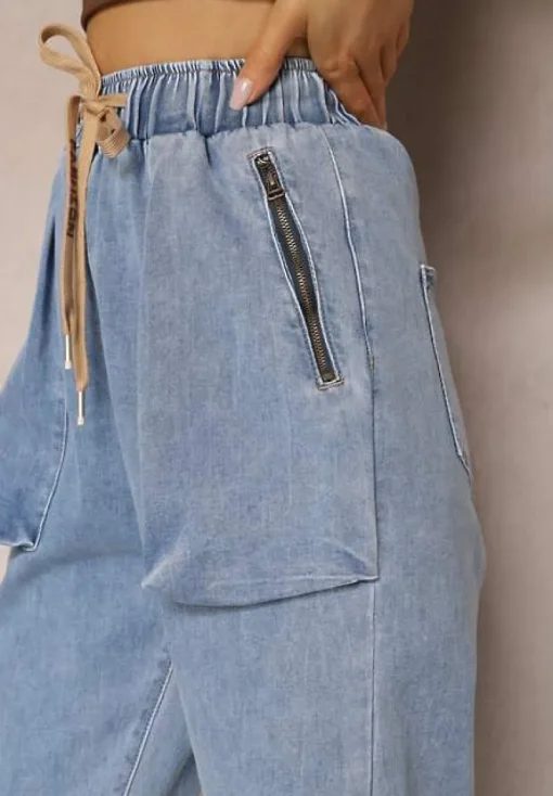 Niebieskie Jeansy Joggery Zapinane na Suwak ze Ściągaczami i Gumką w Pasie Castania