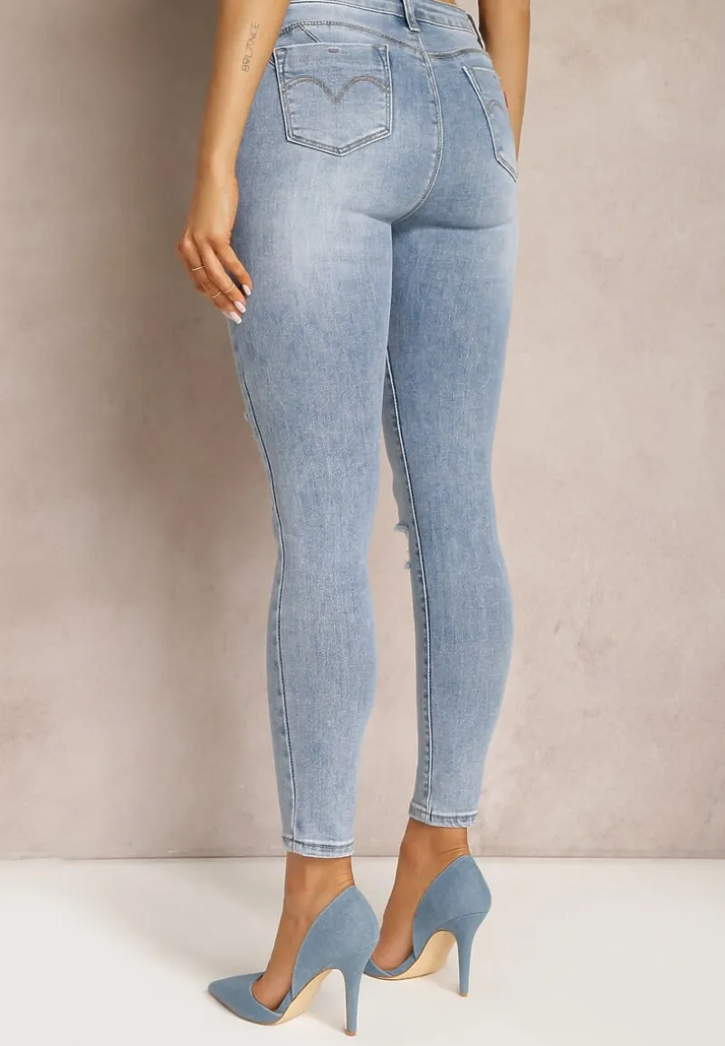 Niebieskie Jeansy Skinny Push Up Ozdobione Dziurami i Przetarciami Jellara