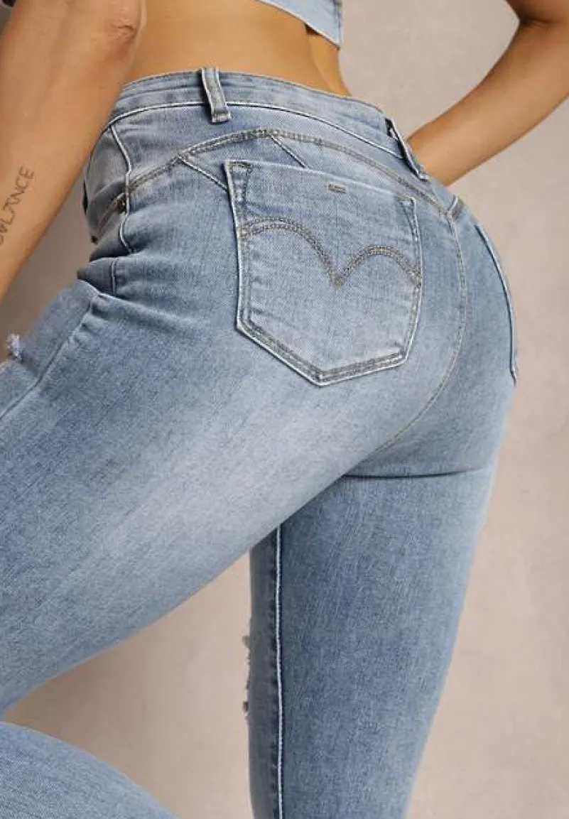 Niebieskie Jeansy Skinny Push Up Ozdobione Dziurami i Przetarciami Jellara