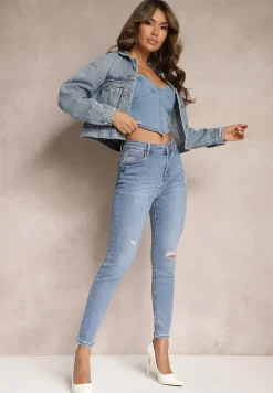 Niebieskie Jeansy z Dziurami i Przetarciami o Fasonie Skinny Klifana