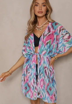 Niebiesko-Różowa Siateczkowa Narzutka z Abstrakcyjnym Motywem Ozdobiona Wiązaniem Revoreia