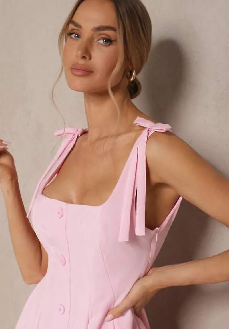 Różowa Sukienka o Rozkloszowanym Kroju Zdobiona Kokardkami i Guzikami Calzeki