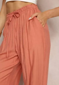 Różowe Brzoskwiniowe Szerokie Spodnie z Wiskozy i Gumką w Pasie Abyga