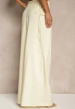 Żółte Spodnie o Szerokim Kroju High Waist z Kwiatem 3D Firalisse